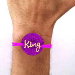 22k Radiant Gold Rakhi With King Written In English - Image 5